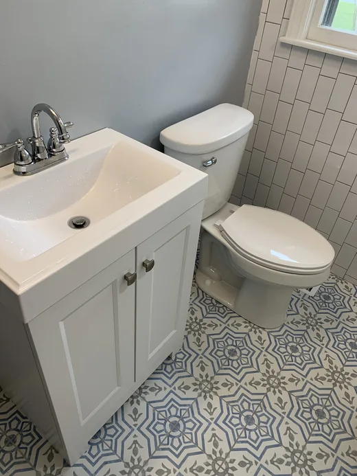 Completed toilet and vanity installation
