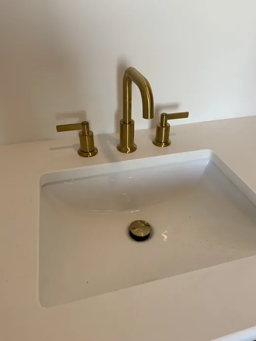 Installed brass bathroom faucet