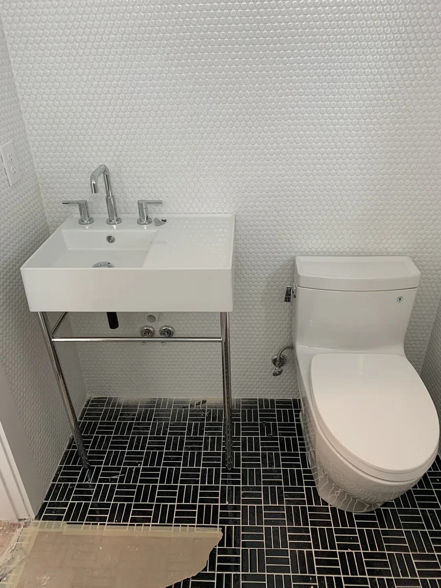 Modern toilet and vanity installation